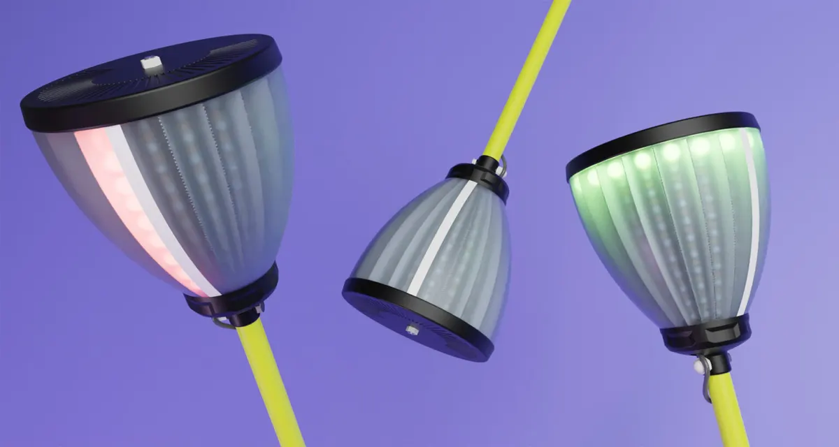 Three mast heads at different angles: one lit with a red LED strip, one unlit, one glowing green