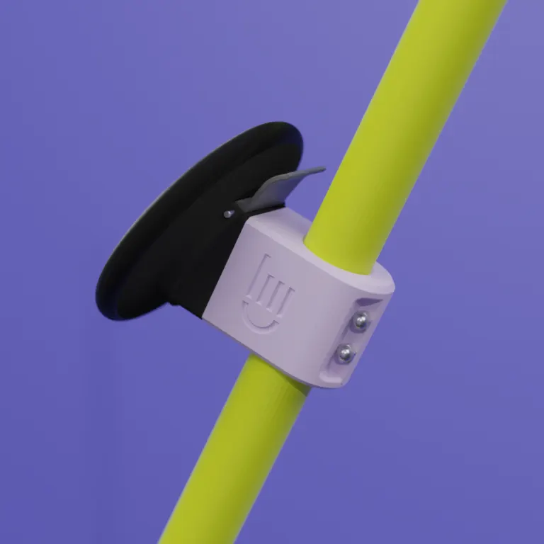 PUK handle clamped to the yellow mast, showing the tactile trigger at the back, like a pallet jack's